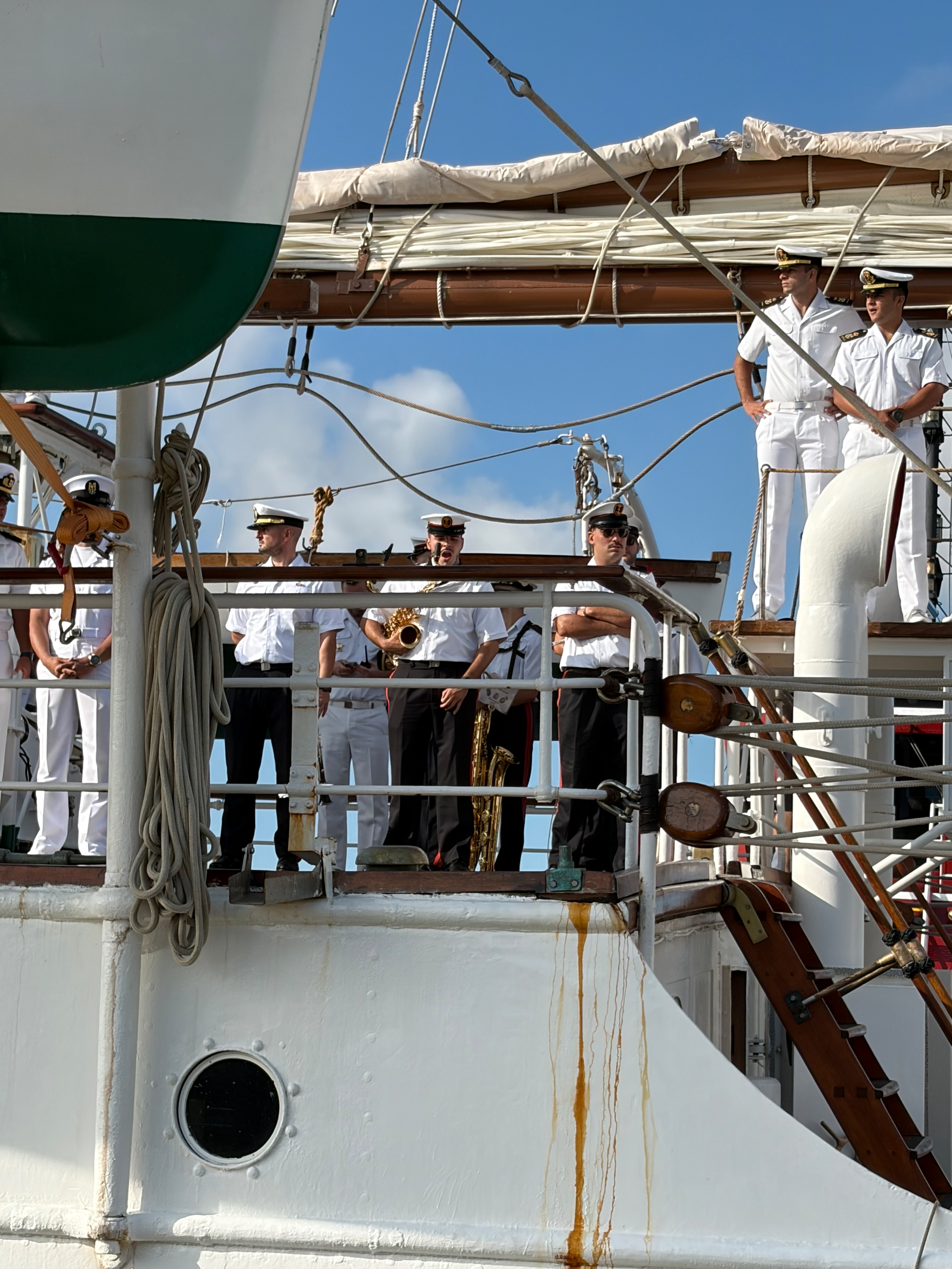 Officers and musicians gathered on deck aboard Juan Sebastián de Elcano